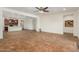 Open living room with kitchen views and tile flooring at 5526 S Grenoble St, Mesa, AZ 85212