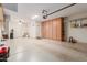 Spacious two-car garage with built-in cabinets and ample storage at 5526 S Grenoble St, Mesa, AZ 85212