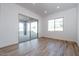 Bright dining area with sliding glass doors leading to the patio at 1356 E Cherrywood Pl, Chandler, AZ 85249