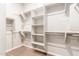 Large walk-in closet with ample shelving and hanging space at 43958 W Stonecreek Rd, Maricopa, AZ 85139