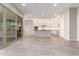 Modern kitchen with island, stainless steel appliances, and white cabinetry at 43958 W Stonecreek Rd, Maricopa, AZ 85139