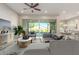 Spacious living room with access to backyard patio at 43958 W Stonecreek Rd, Maricopa, AZ 85139