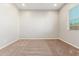 Simple bedroom with neutral walls and a window at 43958 W Stonecreek Rd, Maricopa, AZ 85139