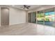 Bright living area with sliding glass doors to backyard at 43958 W Stonecreek Rd, Maricopa, AZ 85139