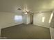 Bedroom with ceiling fan and closet at 747 E Sunnyslope Ln, Phoenix, AZ 85020