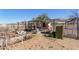 Various animal enclosures with hay bales at 11841 N Lavern Ln, Maricopa, AZ 85139