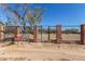 Front yard with brick and metal fence at 11841 N Lavern Ln, Maricopa, AZ 85139