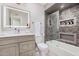 Bathroom with tub, shower, and modern vanity at 8301 E Crestwood Way, Scottsdale, AZ 85250