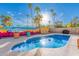 Inviting pool with a fun Scottsdale mural and lounge area at 8301 E Crestwood Way, Scottsdale, AZ 85250