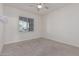 Charming bedroom with a window and ceiling fan at 20403 W Calle Encorvada --, Buckeye, AZ 85396
