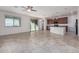 Modern kitchen with dark wood cabinets, granite countertops, and an island at 20403 W Calle Encorvada --, Buckeye, AZ 85396