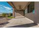 Covered patio with ceiling fan and artificial turf at 20403 W Calle Encorvada --, Buckeye, AZ 85396