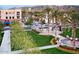 Upscale community center with manicured landscaping and walkways at 21601 W Mariposa St, Buckeye, AZ 85396
