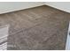 Well-lit bedroom showcasing neutral carpeting at 18195 N San Juan St, Maricopa, AZ 85138
