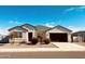 Immaculately kept home with a two-car garage and desert landscaping at 18195 N San Juan St, Maricopa, AZ 85138