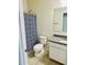 Clean bathroom featuring granite countertop and white vanity at 18195 N San Juan St, Maricopa, AZ 85138