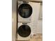 Modern Whirlpool stackable washer and dryer in a bright laundry room at 1432 S Havasupai Dr, Apache Junction, AZ 85119