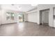 Bright dining area with wood-look floors and access to backyard at 31222 N Cheyenne Dr, San Tan Valley, AZ 85143