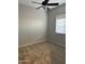 Spacious bedroom with ceiling fan and neutral carpeting at 32030 N 20Th Ln, Phoenix, AZ 85085