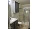 Bathroom boasts a vanity with marble top and a shower stall at 9431 E Coralbell Ave # 113, Mesa, AZ 85208