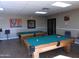 Two pool tables in a well-lit recreational room at 9431 E Coralbell Ave # 113, Mesa, AZ 85208