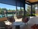 Community pool area with seating and shade at 7740 E Gainey Ranch Rd # 24, Scottsdale, AZ 85258