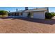 Rear view of house showcasing a large backyard at 11451 S Pawnee Cir, Phoenix, AZ 85044