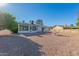 House exterior view with a landscaped backyard at 11451 S Pawnee Cir, Phoenix, AZ 85044