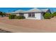 View of the house exterior showcasing landscaping and a clean design at 11451 S Pawnee Cir, Phoenix, AZ 85044