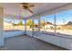 Spacious screened porch overlooks the backyard, perfect for relaxing at 11451 S Pawnee Cir, Phoenix, AZ 85044
