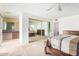 Main bedroom with mirrored closet doors and carpeted floors at 11451 S Pawnee Cir, Phoenix, AZ 85044