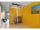 Unique spiral staircase connecting the home's levels at 1425 E Desert Cove Ave # 49, Phoenix, AZ 85020