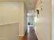 Bright hallway with hardwood floors leading to other rooms at 1425 E Desert Cove Ave # 49, Phoenix, AZ 85020