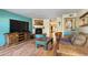 Living room with fireplace and southwestern decor at 1425 E Desert Cove Ave # 49, Phoenix, AZ 85020