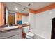 Clean bathroom with a tub, toilet, and sink vanity at 1425 E Desert Cove Ave # 49, Phoenix, AZ 85020