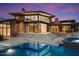 Contemporary home with large windows and infinity pool at 9626 E Aw Tillinghast Rd, Scottsdale, AZ 85262