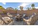 Cozy fire pit area with comfortable seating at 2629 W Quick Draw Way, San Tan Valley, AZ 85144