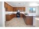 Modern kitchen featuring granite countertops and ample cabinetry at 3169 N Desert Horizons Ln, Casa Grande, AZ 85122