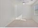 Cozy carpeted bedroom with a window providing natural light at 28614 N Sunset Dr, San Tan Valley, AZ 85143
