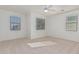 Well-lit bedroom with neutral walls and carpeted floors at 28614 N Sunset Dr, San Tan Valley, AZ 85143