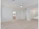 Large main bedroom with access to the bathroom and an additional room at 28614 N Sunset Dr, San Tan Valley, AZ 85143