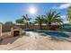 Inviting sparkling pool with a rock waterfall feature at 28614 N Sunset Dr, San Tan Valley, AZ 85143
