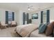 Bright bedroom featuring a comfortable bed and stylish decor at 28614 N Sunset Dr, San Tan Valley, AZ 85143