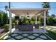 Relaxing patio area with covered seating and ceiling fan at 2301 E Osborn Rd, Phoenix, AZ 85016