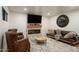 Modern living room featuring a fireplace and stylish furnishings at 2301 E Osborn Rd, Phoenix, AZ 85016