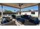 Covered patio with seating area overlooking the refreshing pool at 2301 E Osborn Rd, Phoenix, AZ 85016