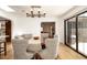 Bright dining room with a rustic chandelier and hardwood floors at 2301 E Osborn Rd, Phoenix, AZ 85016