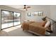 Serene bedroom with pool view and ample natural light at 2301 E Osborn Rd, Phoenix, AZ 85016