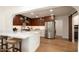 Eat-in kitchen with stainless steel appliances and hardwood floors at 2301 E Osborn Rd, Phoenix, AZ 85016