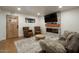 Cozy living room with fireplace and comfortable seating at 2301 E Osborn Rd, Phoenix, AZ 85016